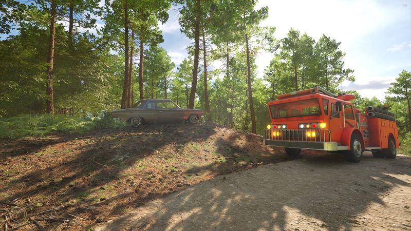 In-game screenshot, fire truck on a forest trail next to a wrecked car