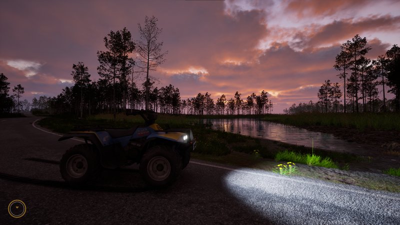 In-game screenshot, quad with headlights on beside a lake at sunset